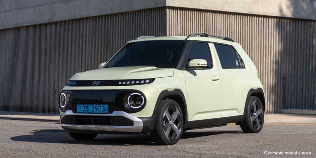 A white 2025 Hyundai Inster electric car